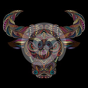 Original vector bull from patterns in the zentangle style on a black background. Symbol of Chinese New Year 2021