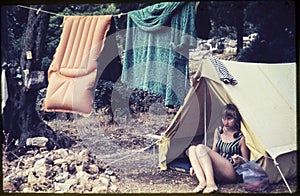 Original vintage colour slide from 1960s, young woman sitting in