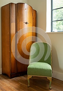 Original vintage deco green Lloyd Loom wicker rattan chair from the 1930s.