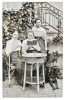Original vintage photo. Portrait of three mature women. Old pict