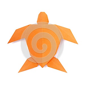 Origmi orange sea turtle on a white background