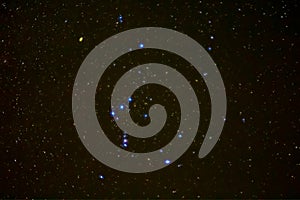 Orion constellation on the night starry sky background