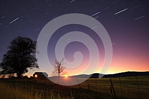 orionids meteor shower over a quiet rural scene