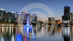 Orlando city skyline at night with fountain and cityscape, Orlando, Florida