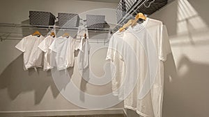 A walkin master bedroom closet in a condominium model home in Orlando, Florida