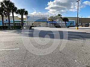 A Walmart on a sunny Christmas day with an empty parking lot