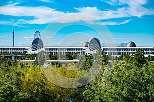 Panoramic view of Orlando Convention Center and green forest background on lightblue sky cloudy background at Seaworld in Internat