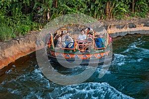 People having fun Kali River Rapids attraction at Animal Kingdom in Walt Disney World area 6