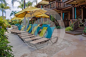 Colorful beach chairs and cabanas at Volcano Bay in Universal Studios area