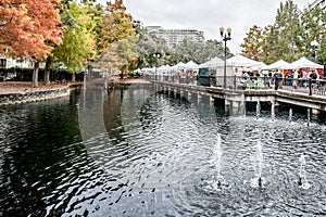 ORLANDO, FLORIDA, USA - DECEMBER, 2018: Eola Lake Park, popular destination for festivals, concerts, fundraising walks and even