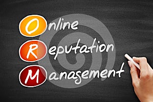 ORM - Online Reputation Management, acronym business concept on blackboard