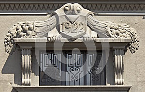 Ornament above the entrance to the building from 20 s