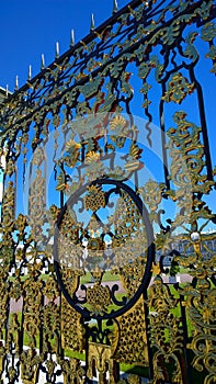 Ornament details of the Golden Gate of the Catherine Palace in Pushkin, suburb of St. Petersburg, Russia. Wrought iron ancient fen