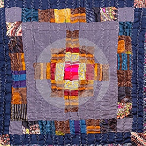 Ornament of handcrafted crinkled patchwork scarf