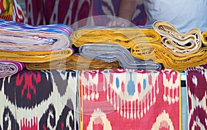 Ornament Ikat Khan Atlas. background of silk fabric with oriental ornaments. uzbek silk with ornament.