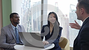 Ornament office with cityscape view, business people hand shaking together