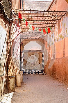 Ornamental drinking fountain in medina of Marrakesh. Morocco