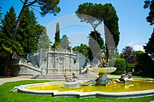 Ornamental fountain in city park over the Lake Como in Tremezzo town, Italy