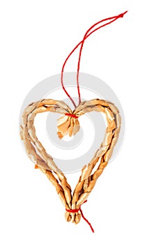 Ornamental heart shape of straw isolated over white