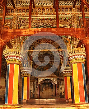 Ornamental king sarafoji siting doom and pillars in ministry hall- dharbar hall- of the thanjavur maratha palace