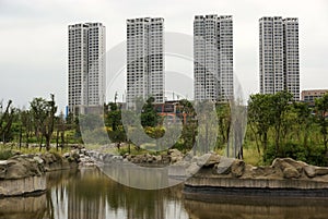 Ornamental lake with high rise buildings