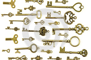 Ornamental medieval vintage keys with intricate forging, composed of fleur-de-lis elements, victorian leaf scrolls and heart shape