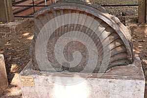 Ornamental Stone with Spokes on Display, Archaeological Museum, Old Goa, India