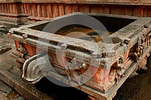 Ornamental stone water tank in the ancient Brihadisvara Temple in Thanjavur, india.