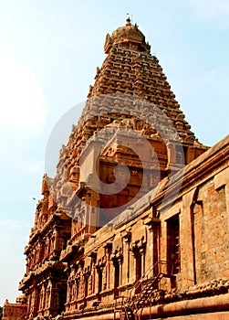 Ornamental wall and the giant tower with single stone doom in the ancient Brihadisvara Temple in Thanjavur, india.