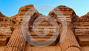 Ornamented with carving column capitel in the Temple of Bacchus, Baalbek, Lebanon photo