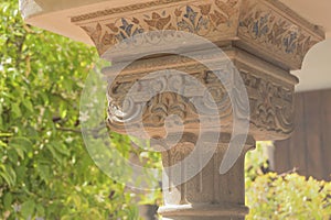 Ornaments in chapiter column in ancient muslim palace of Alcazaba, Malaga, Spain