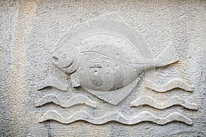 Ornaments, moldings, gargoyle, low reliefs in a sandstone, granite, concrete. sculpting details in Gdansk Danzig.