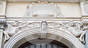 Ornaments, moldings, gargoyle, low reliefs in a sandstone, granite, concrete. sculpting details in Gdansk Danzig.