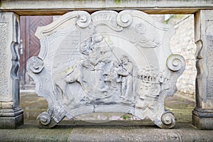 Ornaments, moldings, gargoyle, low reliefs in a sandstone, granite, concrete. sculpting details in Gdansk Danzig.