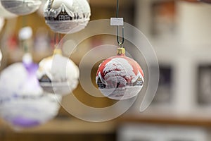 Ornaments and symbols of Christmas hanging on a market stall