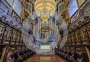 Ornate baroque facade of the Igreja dos Clerigos church in old town Porto, Portugal