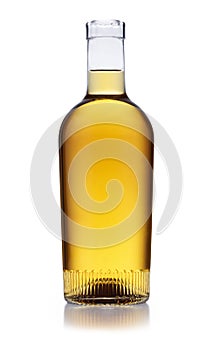 An ornate bottle full of golden whisky, with no label or branding, isolated on white