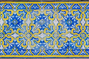 Ornate brightly colored Portugese tile texture in blue and yellow