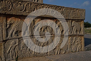 Ornate carvings on the walls of Dasara Dibba or the Mahanavami Dibba, a beautiful stone platform at Hampi Karnataka, India