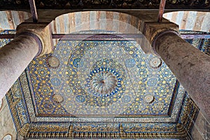 Ornate ceiling with blue and golden floral pattern decorations at Sultan Barquq mosque, Cairo, Egypt
