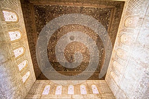 Ornate ceiling carvings in Alhambra palace Granada, Spain
