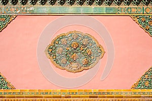 Ornate ceramic detail on a wall at the Forbidden City, Beijing, China