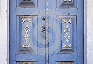 Ornate chapel door detail in historical city of Serro, Brazil photo