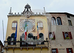 Ornate clock tower on Piazza Liberta Bassano del Grappa, Italy photo