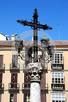 Ornate cross with lamps in the Plaza de la Aduana in the city centre, Malaga, Spain. photo