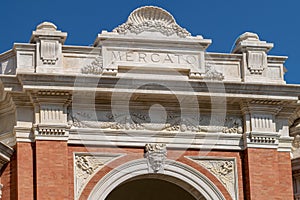The ornate decorative arch entrance to the covered market in Piazza Andrea Costa, Ravenna,