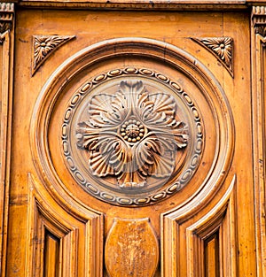 Ornate design on a wooden church door