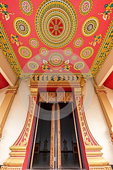 Entrance to Wat That Luang Neau Temple in Vientiane photo