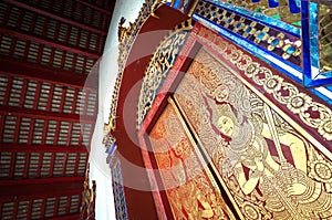 Ornate entrance to the main prayer hall of Wat Phra Singh, Chiang Mai, Thailand