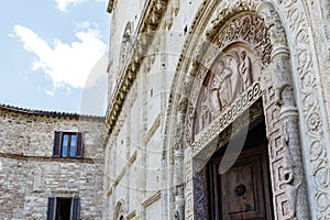 Ornate facade of the Duomo Cathedral of San Rufino in Assisi, Umbria, Italy